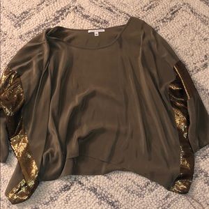 Amanda Uprichard green shirt with gold accents